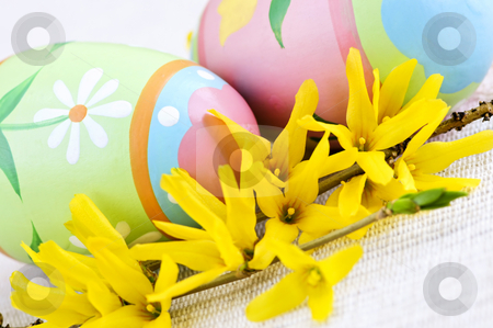 To use this stock image in your creative project, please select the size you need over to the right and click the "Add to Cart" button.
Your downloaded image will come with the Cutcaster watermark removed so don’t worry about the watermark you see on this page. Easter eggs stock photo, Easter eggs arrangement with yellow forsythia flowers by Elena Elisseeva
