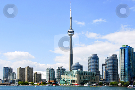 To use this stock image in your creative project, please select the size you need over to the right and click the "Add to Cart" button.
Your downloaded image will come with the Cutcaster watermark removed so don’t worry about the watermark you see on this page. Toronto skyline stock photo, Toronto harbor skyline with CN Tower and skyscrapers by Elena Elisseeva
