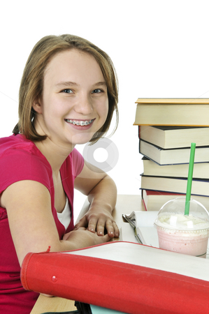 To use this stock image in your creative project, please select the size you need over to the right and click the "Add to Cart" button.
Your downloaded image will come with the Cutcaster watermark removed so don’t worry about the watermark you see on this page. Teenage girl with milkshake stock photo, Teenage school girl studying with a milkshake by Elena Elisseeva
