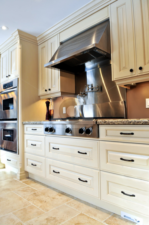 To use this stock image in your creative project, please select the size you need over to the right and click the "Add to Cart" button.
Your downloaded image will come with the Cutcaster watermark removed so don’t worry about the watermark you see on this page. Kitchen interior stock photo, Interior of modern luxury kitchen with stainless steel appliances by Elena Elisseeva