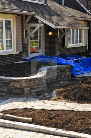 To use this stock image in your creative project, please select the size you need over to the right and click the "Add to Cart" button.
Your downloaded image will come with the Cutcaster watermark removed so don’t worry about the watermark you see on this page. Landscaping work in progress stock photo, Landscaping and paving work in progress at a front yard of a house by Elena Elisseeva