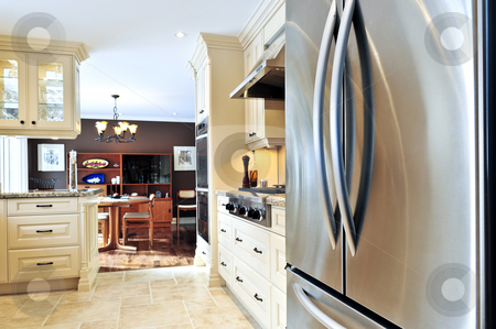 To use this stock image in your creative project, please select the size you need over to the right and click the "Add to Cart" button.
Your downloaded image will come with the Cutcaster watermark removed so don’t worry about the watermark you see on this page. Kitchen interior stock photo, Interior of modern luxury kitchen with stainless steel appliances by Elena Elisseeva