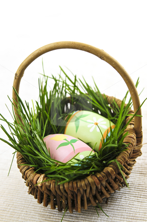 To use this stock image in your creative project, please select the size you need over to the right and click the "Add to Cart" button.
Your downloaded image will come with the Cutcaster watermark removed so don’t worry about the watermark you see on this page. Easter eggs with green grass stock photo, Easter eggs arrangement with green grass in a basket by Elena Elisseeva