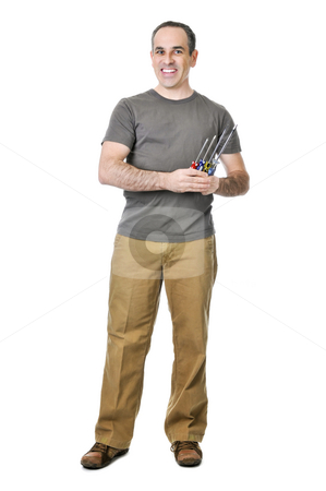 To use this stock image in your creative project, please select the size you need over to the right and click the "Add to Cart" button.
Your downloaded image will come with the Cutcaster watermark removed so don’t worry about the watermark you see on this page. Handyman with screwdrivers stock photo, Smiling handyman holding a bunch of screwdrivers by Elena Elisseeva