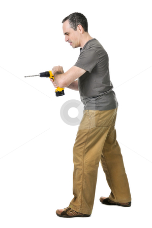 To use this stock image in your creative project, please select the size you need over to the right and click the "Add to Cart" button.
Your downloaded image will come with the Cutcaster watermark removed so don’t worry about the watermark you see on this page. Handyman with a drill stock photo, Strong handyman pushing on his cordless drill by Elena Elisseeva
