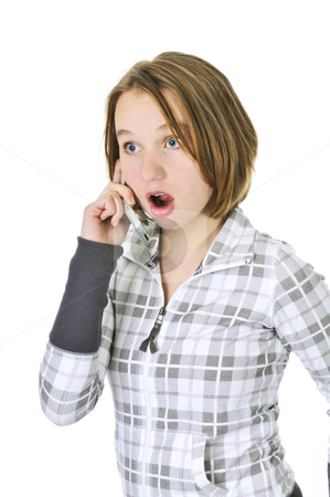 To use this stock image in your creative project, please select the size you need over to the right and click the "Add to Cart" button.
Your downloaded image will come with the Cutcaster watermark removed so don’t worry about the watermark you see on this page. Teenage girl talking on phone stock photo, Teenage girl talking on a cell phone acting surprised isolated on white background by Elena Elisseeva