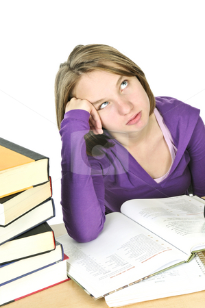 To use this stock image in your creative project, please select the size you need over to the right and click the "Add to Cart" button.
Your downloaded image will come with the Cutcaster watermark removed so don’t worry about the watermark you see on this page. Teenage girl studying stock photo, Unhappy teenage girl studying at the desk by Elena Elisseeva