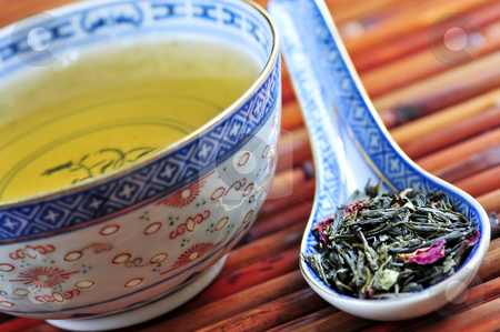To use this stock image in your creative project, please select the size you need over to the right and click the "Add to Cart" button.
Your downloaded image will come with the Cutcaster watermark removed so don’t worry about the watermark you see on this page. Green tea stock photo, Cup of green tea with loose dry leaves in a spoon by Elena Elisseeva