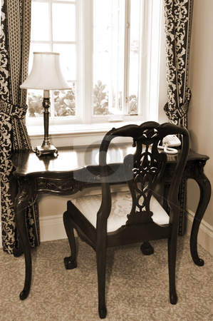 To use this stock image in your creative project, please select the size you need over to the right and click the "Add to Cart" button.
Your downloaded image will come with the Cutcaster watermark removed so don’t worry about the watermark you see on this page. Antique desk and chair stock photo, Antique chair and desk near the window in living room by Elena Elisseeva