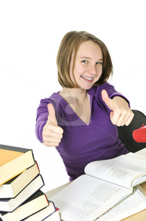 To use this stock image in your creative project, please select the size you need over to the right and click the "Add to Cart" button.
Your downloaded image will come with the Cutcaster watermark removed so don’t worry about the watermark you see on this page. Teenage girl studying stock photo, Happy teenage girl studying at the desk by Elena Elisseeva