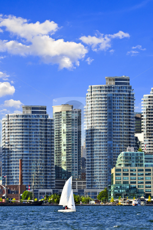 To use this stock image in your creative project, please select the size you need over to the right and click the "Add to Cart" button.
Your downloaded image will come with the Cutcaster watermark removed so don’t worry about the watermark you see on this page. Sailing in Toronto harbor stock photo, Sailboat sailing in Toronto harbour with scenic waterfront view by Elena Elisseeva