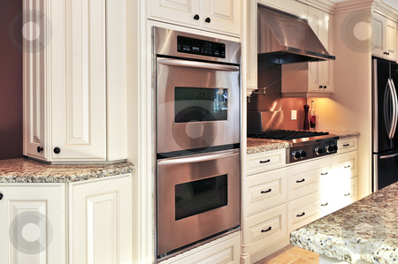To use this stock image in your creative project, please select the size you need over to the right and click the "Add to Cart" button.
Your downloaded image will come with the Cutcaster watermark removed so don’t worry about the watermark you see on this page. Kitchen interior stock photo, Interior of modern luxury kitchen with stainless steel appliances by Elena Elisseeva