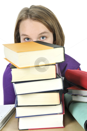 To use this stock image in your creative project, please select the size you need over to the right and click the "Add to Cart" button.
Your downloaded image will come with the Cutcaster watermark removed so don’t worry about the watermark you see on this page. Teenage girl studying stock photo, Frustrated teenage girl studying at the desk with big stack of books by Elena Elisseeva