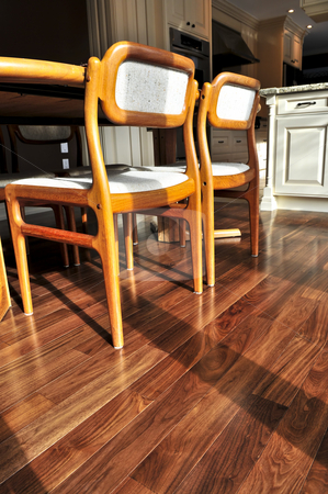 To use this stock image in your creative project, please select the size you need over to the right and click the "Add to Cart" button.
Your downloaded image will come with the Cutcaster watermark removed so don’t worry about the watermark you see on this page. Hardwood floor stock photo, Hardwood walnut floor in residential home dining room by Elena Elisseeva