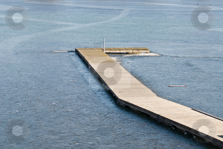 To use this stock image in your creative project, please select the size you need over to the right and click the "Add to Cart" button.
Your downloaded image will come with the Cutcaster watermark removed so don’t worry about the watermark you see on this page. Loneliness stock photo, A lonely rack frozen in a lake in a meditative winter landscape by Alexander L?