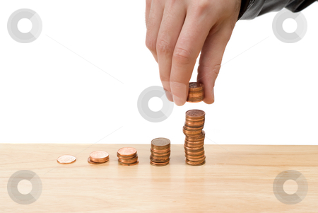 To use this stock image in your creative project, please select the size you need over to the right and click the "Add to Cart" button.
Your downloaded image will come with the Cutcaster watermark removed so don’t worry about the watermark you see on this page. Increasing Savings stock photo, Stacks of pennies growing progressively higher with a hand adding more to the highest one, with copyspace by Richard Nelson