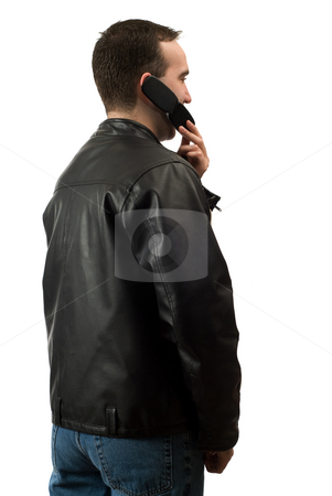 To use this stock image in your creative project, please select the size you need over to the right and click the "Add to Cart" button.
Your downloaded image will come with the Cutcaster watermark removed so don’t worry about the watermark you see on this page. Casual Man On Cellphone stock photo, A young man wearing a leather jacket is facing away from the camera and talking on his cellphone, isolated against a white background by Richard Nelson