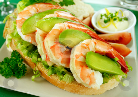 To use this stock image in your creative project, please select the size you need over to the right and click the "Add to Cart" button.
Your downloaded image will come with the Cutcaster watermark removed so don’t worry about the watermark you see on this page. Shrimp And Avocado Sandwich stock photo, Delightful fresh shrimp and avocado open sandwich with lemon mayonnaise. by Brett Mulcahy