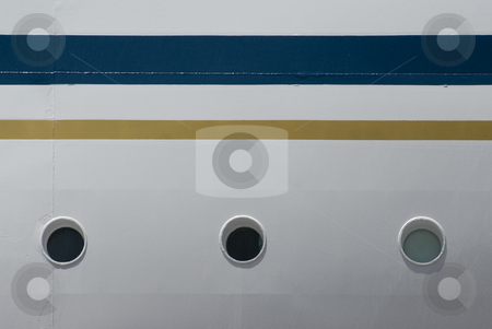To use this stock image in your creative project, please select the size you need over to the right and click the "Add to Cart" button.
Your downloaded image will come with the Cutcaster watermark removed so don’t worry about the watermark you see on this page. Portholes stock photo, A row of three portholes on the site of a cruise ship by Stephen Gibson