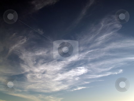 To use this stock image in your creative project, please select the size you need over to the right and click the "Add to Cart" button.
Your downloaded image will come with the Cutcaster watermark removed so don’t worry about the watermark you see on this page. High mares tail clouds in gradiant sky light to dark stock photo, High clouds in sky going from light to dark by Jeff Cleveland