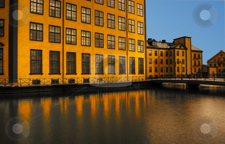 To use this stock image in your creative project, please select the size you need over to the right and click the "Add to Cart" button.
Your downloaded image will come with the Cutcaster watermark removed so don’t worry about the watermark you see on this page. Yellow house stock photo, Old industry building by the water by Magnus Johansson