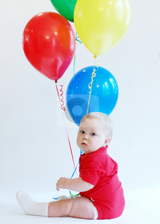 To use this stock image in your creative project, please select the size you need over to the right and click the "Add to Cart" button.
Your downloaded image will come with the Cutcaster watermark removed so don’t worry about the watermark you see on this page. Toddler with Balloons stock photo, Portrait of a toddler boy wearing a red body-suit holding a bunch of balloons. by Orange Line Media