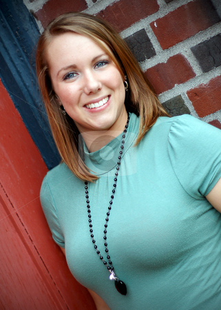 To use this stock image in your creative project, please select the size you need over to the right and click the "Add to Cart" button.
Your downloaded image will come with the Cutcaster watermark removed so don’t worry about the watermark you see on this page. Teen Standing with Back to Brick Wall stock photo, Vertically framed shot of a teenage girl standing with her back against a brick wall looking at the camera. by Orange Line Media