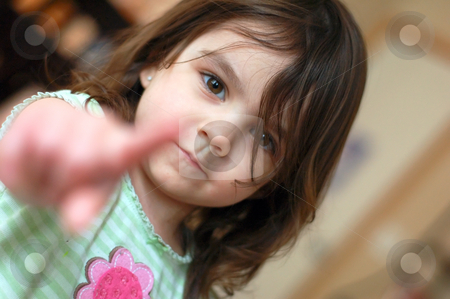 To use this stock image in your creative project, please select the size you need over to the right and click the "Add to Cart" button.
Your downloaded image will come with the Cutcaster watermark removed so don’t worry about the watermark you see on this page. Cute Young Girl Pointing stock photo, Cute young girl pointing her index finger at the camera. Her face is in focus and finger is blurred by depth of field by Orange Line Media