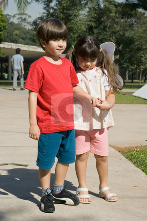 To use this stock image in your creative project, please select the size you need over to the right and click the "Add to Cart" button.
Your downloaded image will come with the Cutcaster watermark removed so don’t worry about the watermark you see on this page. Brother and Sister stock photo, Adorable young brother and sister holding hands as they stand in a park togeter by Orange Line Media