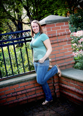 To use this stock image in your creative project, please select the size you need over to the right and click the "Add to Cart" button.
Your downloaded image will come with the Cutcaster watermark removed so don’t worry about the watermark you see on this page. Teen Standing to Brick Column stock photo, Vertically framed outdoors shot of a teenage girl standing next to a red brick column. by Orange Line Media