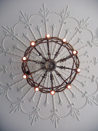 To use this stock image in your creative project, please select the size you need over to the right and click the "Add to Cart" button.
Your downloaded image will come with the Cutcaster watermark removed so don’t worry about the watermark you see on this page. Antique Chandelier stock photo, A shot of an antique chandelier, shot looking straight up. by Orange Line Media