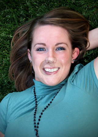 To use this stock image in your creative project, please select the size you need over to the right and click the "Add to Cart" button.
Your downloaded image will come with the Cutcaster watermark removed so don’t worry about the watermark you see on this page. Teen Lying on Grass Looking Up stock photo, Vertically framed outdoor headshot of a teenage girl lying on grass looking up at the camera. by Orange Line Media
