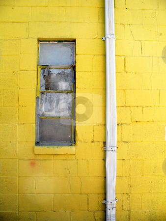 To use this stock image in your creative project, please select the size you need over to the right and click the "Add to Cart" button.
Your downloaded image will come with the Cutcaster watermark removed so don’t worry about the watermark you see on this page. Broken Window stock photo, Broken window next to a drainpipe framed by the yellow wall of an abandoned building by Orange Line Media