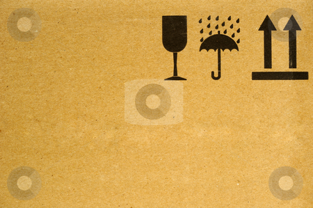 To use this stock image in your creative project, please select the size you need over to the right and click the "Add to Cart" button.
Your downloaded image will come with the Cutcaster watermark removed so don’t worry about the watermark you see on this page. Handle with care stock photo, The symbols 'fragile', 'keep dry' and 'this way up' on the side of a cardboard box. Space for text on the cardboard. by Alistair Scott