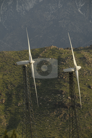 To use this stock image in your creative project, please select the size you need over to the right and click the "Add to Cart" button.
Your downloaded image will come with the Cutcaster watermark removed so don’t worry about the watermark you see on this page. Windmills in the Desert stock photo, Windmills being used to provide energy by Timothy OLeary