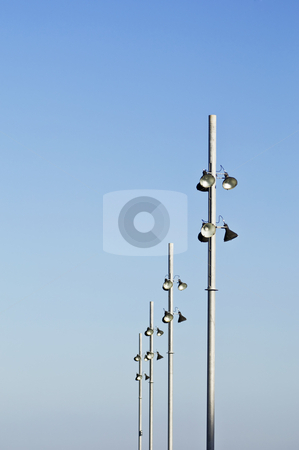 To use this stock image in your creative project, please select the size you need over to the right and click the "Add to Cart" button.
Your downloaded image will come with the Cutcaster watermark removed so don’t worry about the watermark you see on this page. Streetlight stock photo, Modern streetlights against a clear blue sky by Manuel Ribeiro