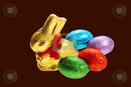 To use this stock image in your creative project, please select the size you need over to the right and click the "Add to Cart" button.
Your downloaded image will come with the Cutcaster watermark removed so don’t worry about the watermark you see on this page. Golden chocolate Easter bunny with egg stock photo, A golden chocolate Easter bunny with eggs isolated with area for text by Christopher Meder