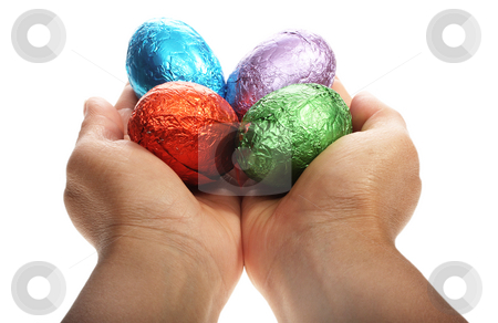 To use this stock image in your creative project, please select the size you need over to the right and click the "Add to Cart" button.
Your downloaded image will come with the Cutcaster watermark removed so don’t worry about the watermark you see on this page. Hands holding four Easter eggs stock photo, Two hands holding chocolate Easter eggs isolated with area for text by Christopher Meder