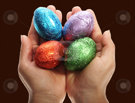 To use this stock image in your creative project, please select the size you need over to the right and click the "Add to Cart" button.
Your downloaded image will come with the Cutcaster watermark removed so don’t worry about the watermark you see on this page. Holding four chocolate Easter eggs stock photo, Two hands holding four chocolate Easter eggs isolated with area for text by Christopher Meder