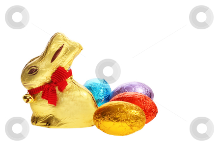 To use this stock image in your creative project, please select the size you need over to the right and click the "Add to Cart" button.
Your downloaded image will come with the Cutcaster watermark removed so don’t worry about the watermark you see on this page. Golden chocolate Easter bunny with eggs stock photo, A golden chocolate Easter bunny with eggs isolated with area for text by Christopher Meder