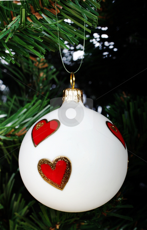 To use this stock image in your creative project, please select the size you need over to the right and click the "Add to Cart" button.
Your downloaded image will come with the Cutcaster watermark removed so don’t worry about the watermark you see on this page. Christmas decoration stock photo, Glass Christmas decoration on a green tree by Christopher Meder