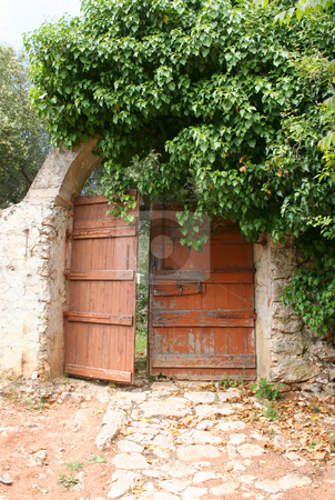 To use this stock image in your creative project, please select the size you need over to the right and click the "Add to Cart" button.
Your downloaded image will come with the Cutcaster watermark removed so don’t worry about the watermark you see on this page. Secret garden gate stock photo, Very old gate at a ruined monastery on Zante (Zakynthos) by Helen Shorey