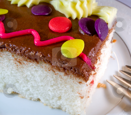 To use this stock image in your creative project, please select the size you need over to the right and click the "Add to Cart" button.
Your downloaded image will come with the Cutcaster watermark removed so don’t worry about the watermark you see on this page. Cake3 stock photo, Slice of chocolate cake with icing by Ira J Lyles Jr