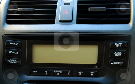 To use this stock image in your creative project, please select the size you need over to the right and click the "Add to Cart" button.
Your downloaded image will come with the Cutcaster watermark removed so don’t worry about the watermark you see on this page. Music in the car stock photo, Stereo and ventilation system in a new car by Albert Lozano