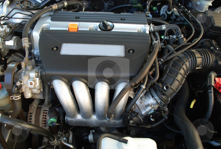 To use this stock image in your creative project, please select the size you need over to the right and click the "Add to Cart" button.
Your downloaded image will come with the Cutcaster watermark removed so don’t worry about the watermark you see on this page. Car engine stock photo, Stock pictures of an engine inside of a car by Albert Lozano
