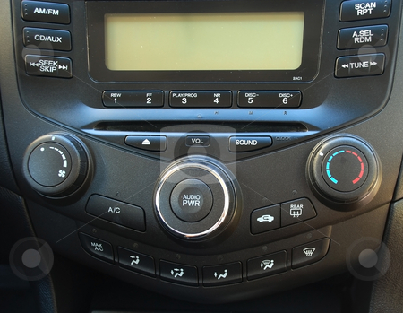 To use this stock image in your creative project, please select the size you need over to the right and click the "Add to Cart" button.
Your downloaded image will come with the Cutcaster watermark removed so don’t worry about the watermark you see on this page. Music in the car stock photo, Stereo and ventilation system in a new car by Albert Lozano