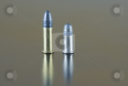 To use this stock image in your creative project, please select the size you need over to the right and click the "Add to Cart" button.
Your downloaded image will come with the Cutcaster watermark removed so don’t worry about the watermark you see on this page. Different stock photo, Five .22 rifle rimfire cartridge, short and long, on a table by Serge VILLA