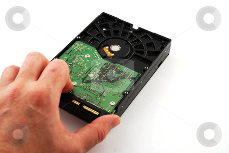 To use this stock image in your creative project, please select the size you need over to the right and click the "Add to Cart" button.
Your downloaded image will come with the Cutcaster watermark removed so don’t worry about the watermark you see on this page. Hard drive case stock photo, Pictures of the case for a hard drive in a computer by Albert Lozano