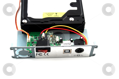 To use this stock image in your creative project, please select the size you need over to the right and click the "Add to Cart" button.
Your downloaded image will come with the Cutcaster watermark removed so don’t worry about the watermark you see on this page. Electronic parts and circuits stock photo, Pictures of the interior of a consumer electronics product showing the different components by Albert Lozano