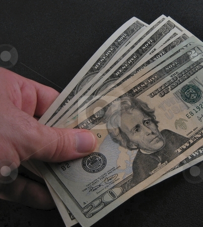 To use this stock image in your creative project, please select the size you need over to the right and click the "Add to Cart" button.
Your downloaded image will come with the Cutcaster watermark removed so don’t worry about the watermark you see on this page. Money stock photo, Dollar Bils by Albert Lozano